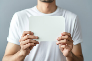 Man holds a blank white sign in hands. Generative AI