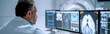© Pixelmagic - Senior male doctor looking at x-ray image in hospital. panoramic banners