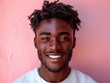 © hakule - happy smiling African American man portrait, professional studio background