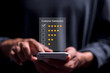 © Pakin - Customer Satisfaction Survey concept, Customer using smartphone give excellent five-star ratings for service experience rating online application, satisfaction feedback review, good quality most.