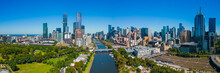 An Aerial View Of The Melbourne CBD Skyline Behind The Yarra River On A Sunny Morning In Summer. 