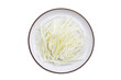 White garlic chives on white background.