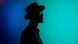 © Rendara Studio - Stylish black man wearing hat and sunglasses under blue cool tones