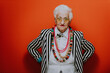 © oneinchpunch - Funny grandmother portraits. Senior old woman dressing elegant for a special event. granny fashion model on colored backgrounds