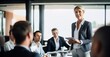 © Stock Pix - a boardroom setting, of a mature businesswoman confidently presenting her ideas to a group of attentive colleagues