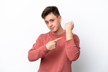 Wall Mural - Young handsome Brazilian man isolated on white background making the gesture of being late