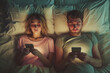 a married couple in bed with smartphones