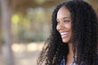 © Antonioguillem - Happy black woman smiling with perfect teeth