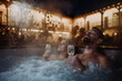 © Halfpoint - Beautiful mature couple relaxing in outdoor hot tub, drinking champagne, enjoying romantic wellness weekend in spa. Concept of Valentine's Day.