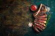 Sliced grilled meat steak Rib eye medium rare set, on wooden serving board. Top view.