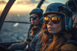 Couple in the cockpit of a helicopter at sunset