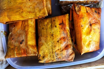 Pais waluh cake or a type of nagasari contains pumpkin and flour that has been steamed using banana leaves.