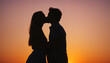 © Lanochkin Ilya - Silhouette of a couple kissing at sunset
