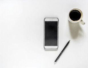 Wall Mural - Top view of a Mobile phone with a cup coffee on white background.