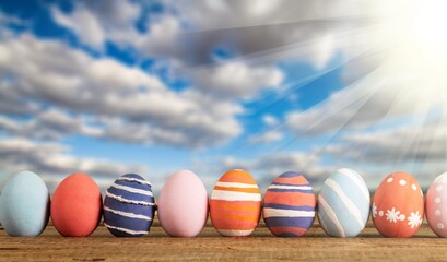 Wall Mural - Colorful Easter Eggs on Spring Background