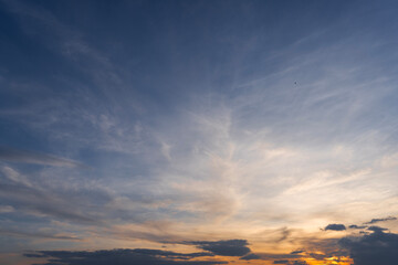 Wall Mural - beautiful bright sunset sky with clouds. nature sky background.