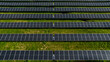 Aerial view on solar panels in a country meadow. Green, eco-sustainable and renewable energy system. There is nobody.