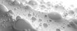 Closeup of white transparent drops liquid bubbles molecules