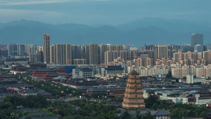 Sticker - Time lapse view of Xian Dayan Pagoda and city skyline in Shanxi, China