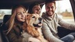 The whole family is driving for the weekend. Mom and Dad with their daughter and a Labrador dog are sitting in the car. Leisure, travel, tourism