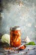 jar with homemade fermented cabbage kimchi traditional Korean dish recipe food fresh organic side dish with magazine editorial food photography look and copy space