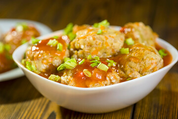 chinese-style meatballs in sweet and sour sauce