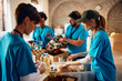 © Drazen - Diverse group of people sorting donated food for those in need while working at community center,