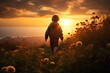A child stands amidst tall grass, silhouetted against a breathtaking sunset, emanating a sense of wonder and tranquility.