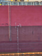 Embarkation pilot ladder and draught marks with Plimsoll Mark on large cargo ship