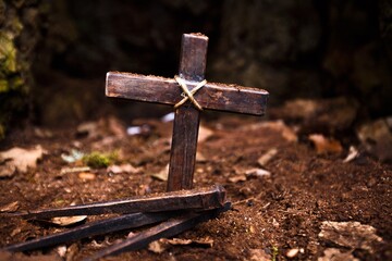 Wall Mural - Christian wooden cross and hammer with metal Nails on ground