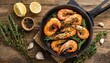 Top view of prawns shrimps roasted on pan with herbs isolated on rustic wooden kitchen table
