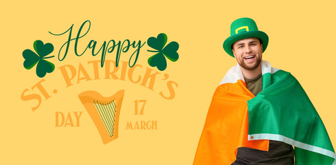 Wall Mural - Festive banner for Happy St. Patrick's Day with young man holding Irish flag