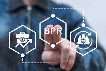 Businessman using virtual touch screen presses abbreviation: BPR. Concept of Business Process Reengineering ( BPR ). Conceptual Business Model Strategy Organization.