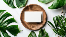 Modern Mock Up, 2 Blank Business Cards On A Wooden Plate, Decorated With Aralia And Monstera Leaves On White Background. Corporate Identity Templates With A Tropical Touch.