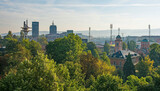 Fototapeta  - Rooftop panoramic view of Banja Luka, capital city of the Republika Srpska part of Bosnia and Herzegovina. The clock tower of Saint Bonaventure Cathedral is left, Holy Trinity Orthodox Church is right