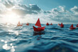 © vefimov - Group of red paper boats floating on top of body of water. Perfect for adding touch of color and whimsy to any project