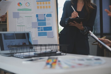 Close up ux developer and ui designer use augmented reality brainstorming about mobile app interface wireframe design on desk at modern office.Creative digital development agency