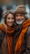© TheGoldTiger - Two smiling individuals, likely family, warmly dressed in coordinated earth tones, embracing on a chilly day