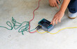 © auttawit - Ground Test box for inject into electrical equipment for testing resistance between electrical earth with earth or grounding system.