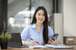 © SOMKID - Happy asian young businesswoman excited with smartphone at workplace, Excited happy Asian woman.