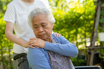 Wall Mural - caregiver help and care Asian senior woman patient sitting on wheelchair at nursing hospital ward, healthy strong medical concept.