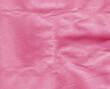 Crumpled pink craft paper sheet