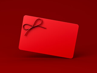 Poster - All red gift card or blank minimal red gift card or gift voucher with red rope ribbon bow isolated on dark red background minimal conceptual 3D rendering