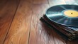 A stack of vinyl records on the wooden floor.