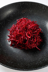 Canvas Print - beetroot salad on black plate