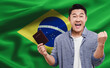 Immigration. Happy man with passport against national flag of Brazil, space for text. Banner design