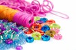 colorful beads and sequins next to embroidery thread