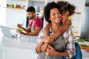 Wall Mural - caring african american mother hugging teenage daughter, enjoy moment of love, motherhood concept