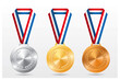 golden, silver and bronze medals with tricolor ribbon