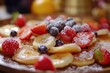 Delicious and homemade mini pancakes as a sweet perfect snack Poffertjes with fruits as sweet breakfast